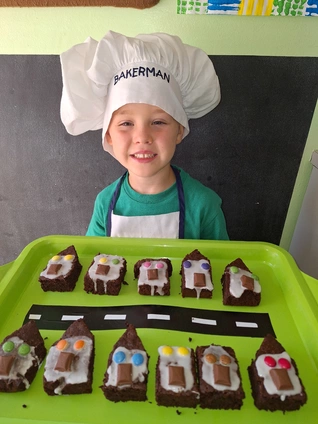 A young boy in a chef A young boy in a chef